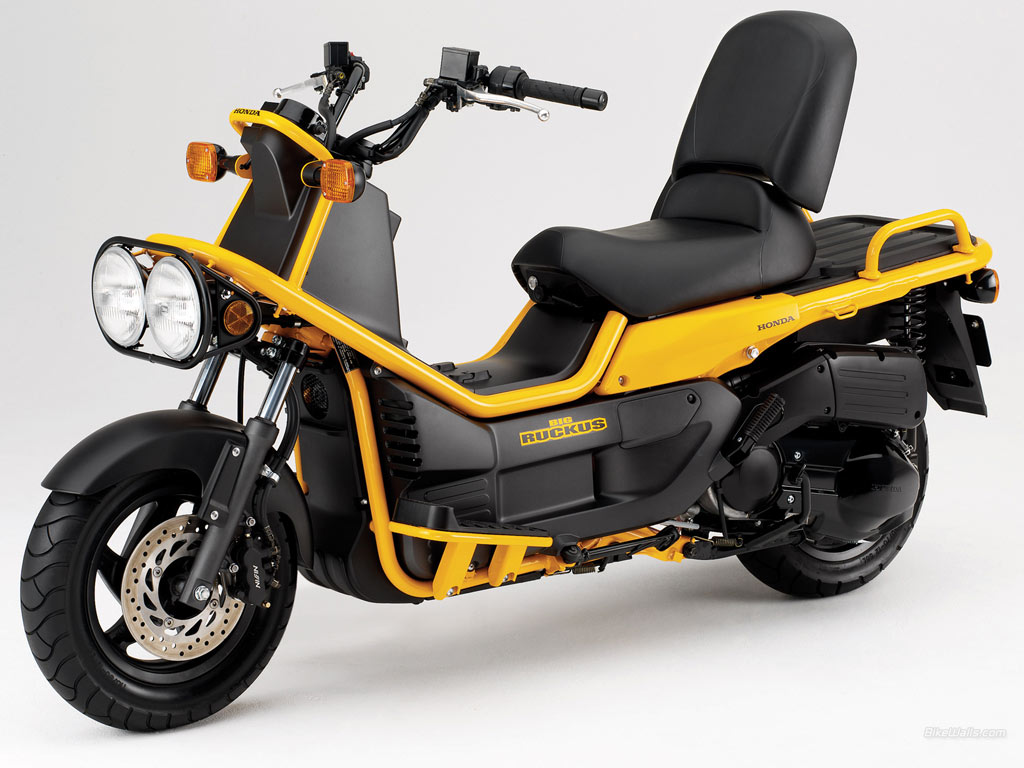 yellow honda scooter