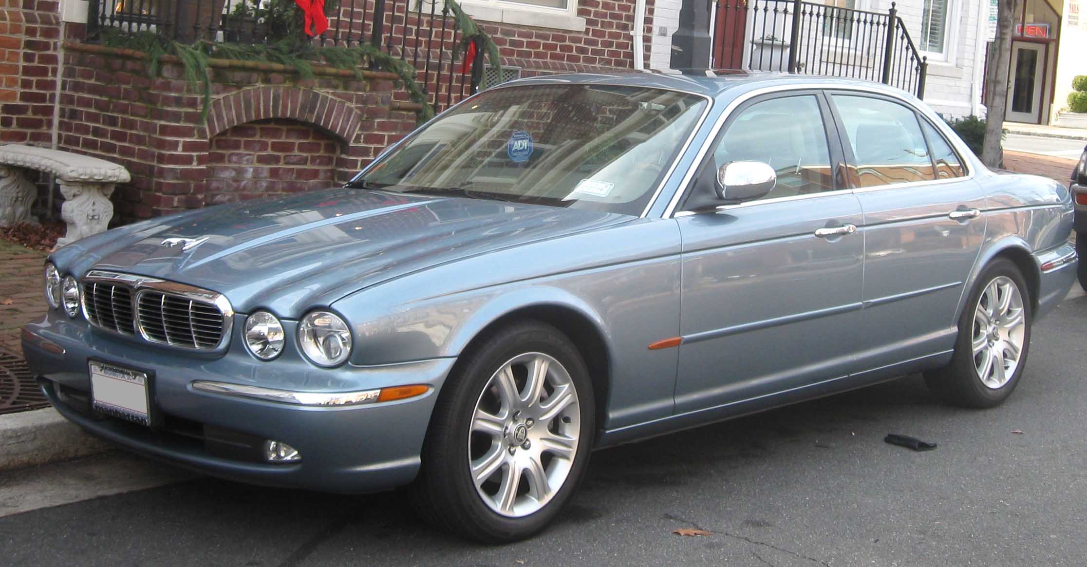 silver car jaguar XJ