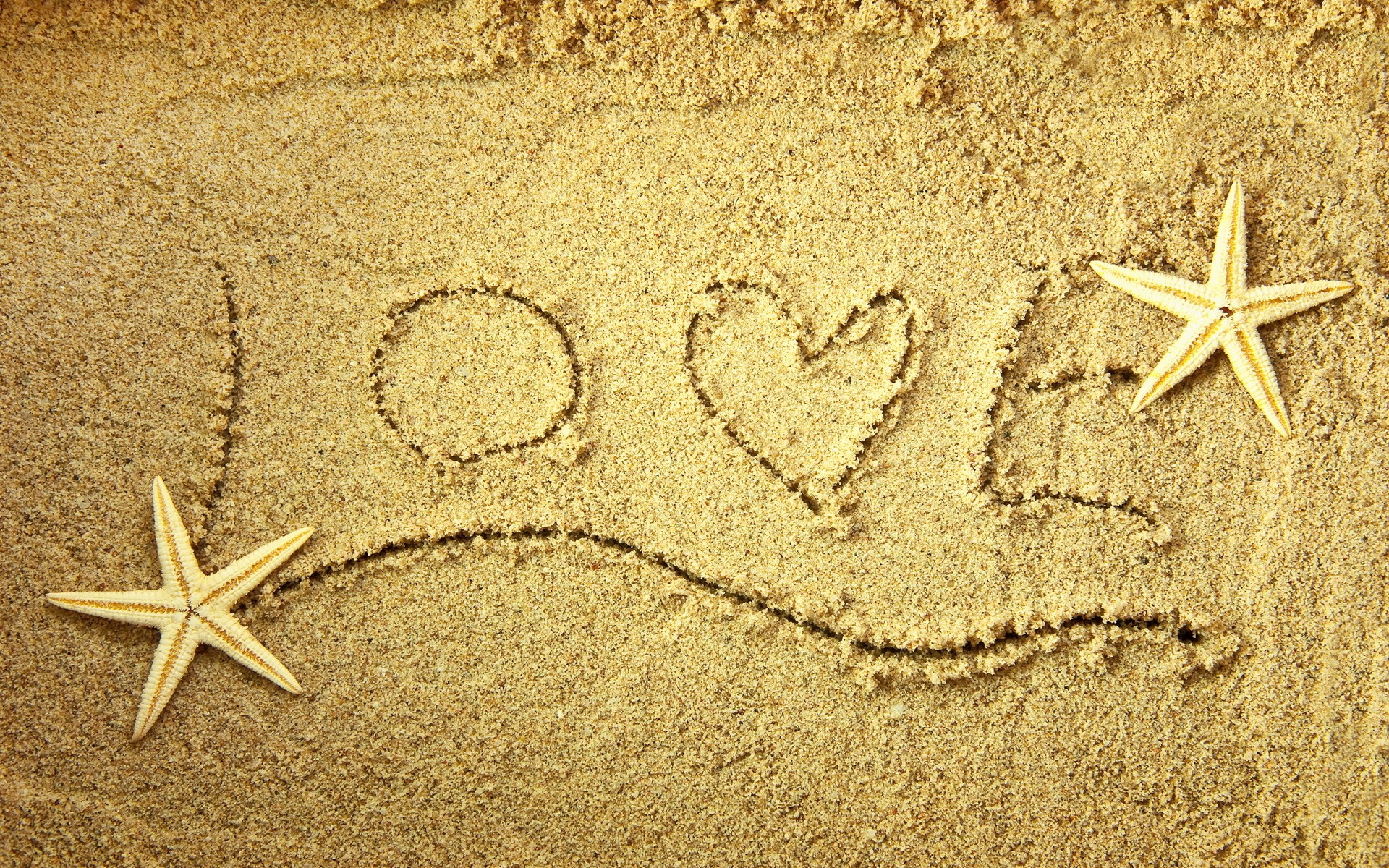 widescreen love heart on sand
