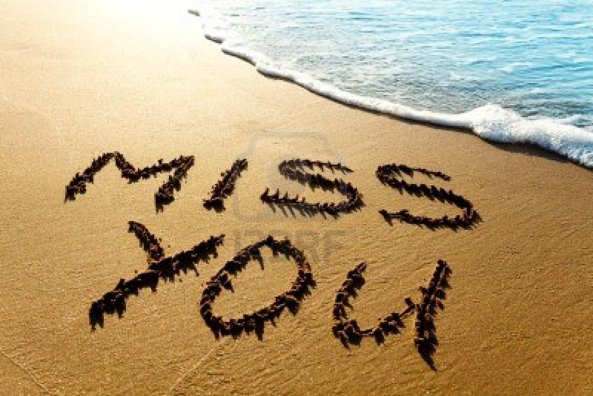 miss you written on beach