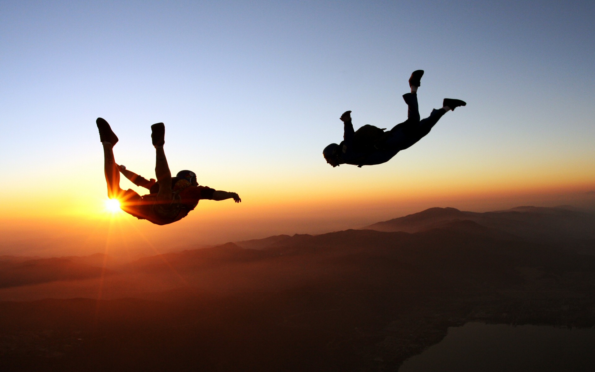 two persons skydiving image
