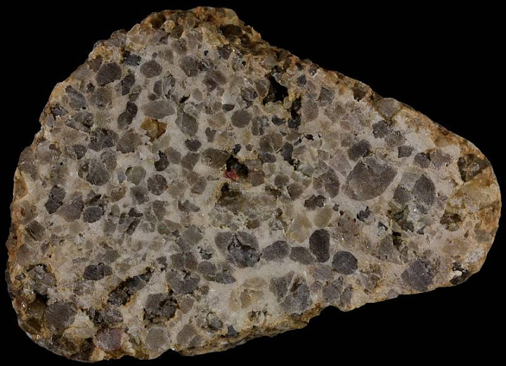 black background conglomerate rock
