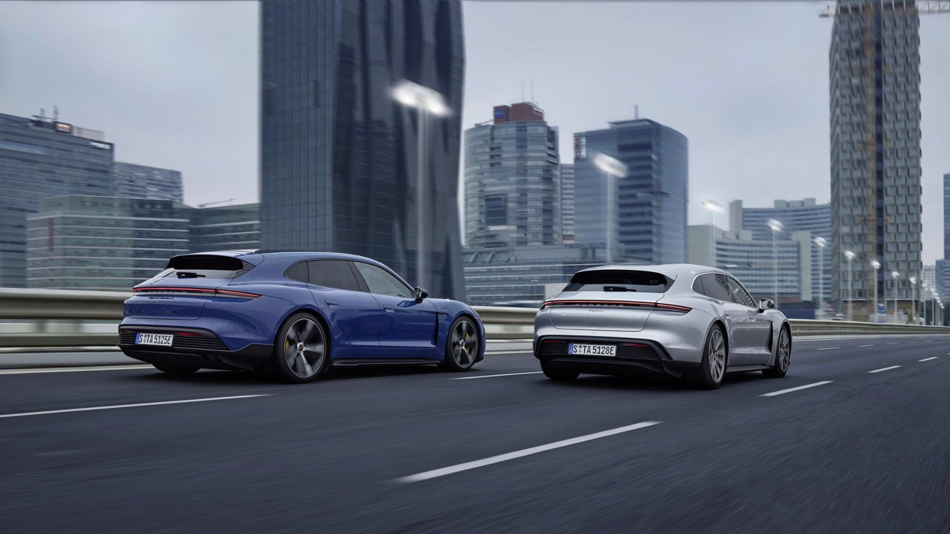 blue and grey Porsche Taycan Sport Turismo