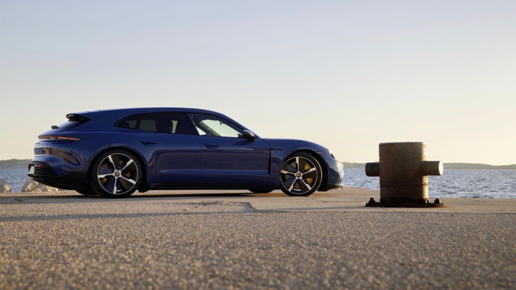 blue car Porsche Taycan Sport Turismo photo